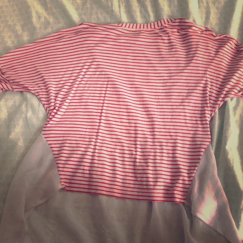 A red and white high low shirt